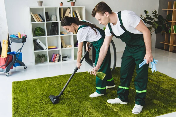 depositphotos_207466526-stock-photo-young-cleaning-company-workers-cleaning